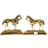 A pair of Victorian Brass door stops modelled as horses,