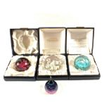 Four boxed Caithness paperweights