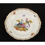 A 19th Century Meissen plate painted with exotic birds and insects