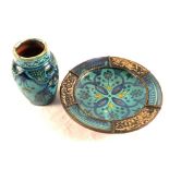 A Persian turquoise vase and a metal mounted plate