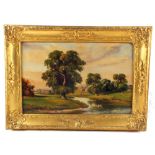 A signed Robert Mallett oil on canvas of a countryside river scene with cows in the background