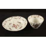 An 18th Century Newhall type spiral moulded floral tea bowl and saucer