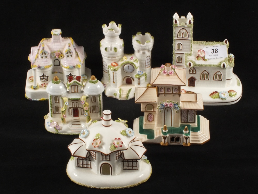 Six various Coalport porcelain cottage ornaments