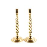 A pair of Edwardian open barley twist Brass candlesticks,