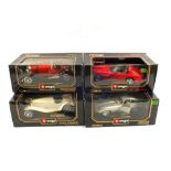 Four large boxed Burago models