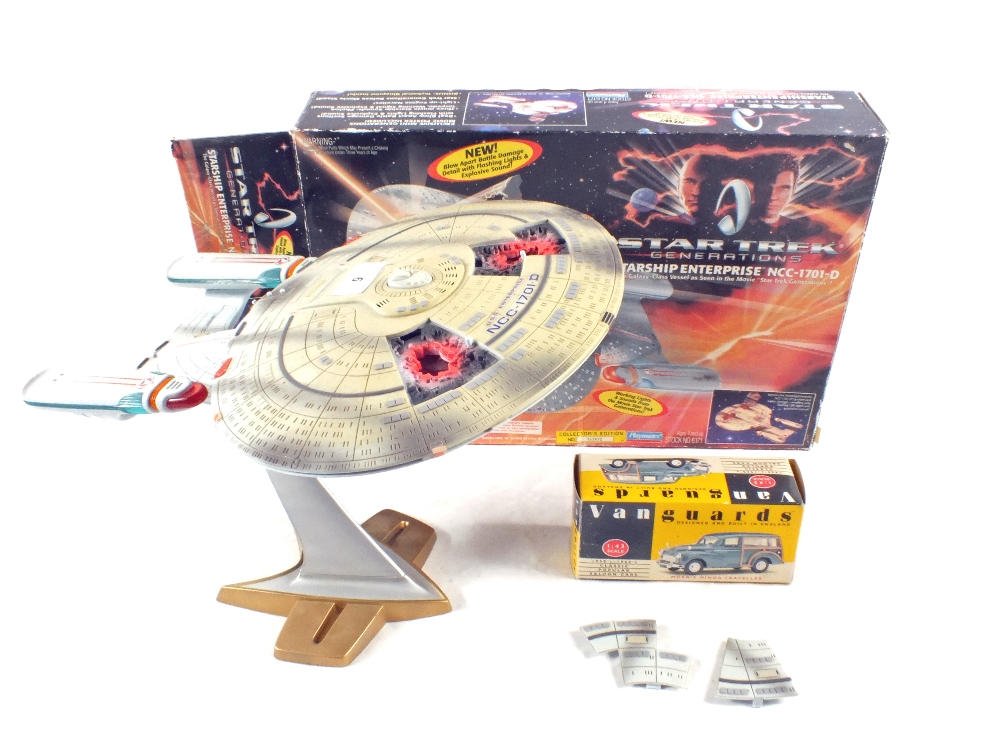 A boxed Playmates Starship Enterprise NCC-1701-D and a Vanguard model
