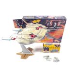 A boxed Playmates Starship Enterprise NCC-1701-D and a Vanguard model