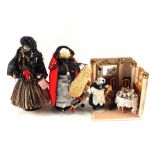 Peddlar and fortune telling dolls and a model dining room