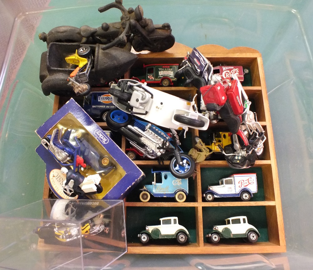 Two display racks of Matchbox models and various motorcycles