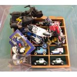 Two display racks of Matchbox models and various motorcycles