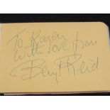 An autograph album containing numerous signatures including Beryl Reid, Barbara Windsor,
