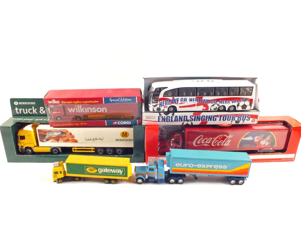 Various promotional trucks including Morrisons, Coca Cola,