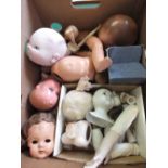 Various porcelain and other dolls heads and body parts