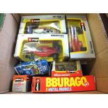 Twelve boxed and unboxed Burago models