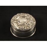 A Silver bird decorated trinket box,