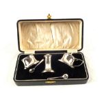 A cased Silver cruet set,