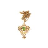 A 15ct Gold Art Nouveau Seed Pearl and Peridot pendant hung on chain