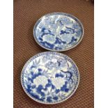 A pair of Japanese blue and white floral chargers