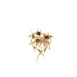 A 9ct Gold floral spray brooch set with Garnets