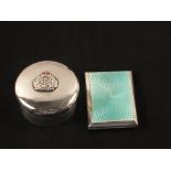 A Silver circular box with hinged lid with part enamel Royal Navy emblem, Charles Penny Brown,