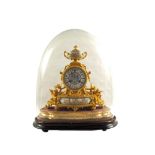 A 19th Century French Ormolu mantel clock under a glass dome with floral Sevres type porcelain urn