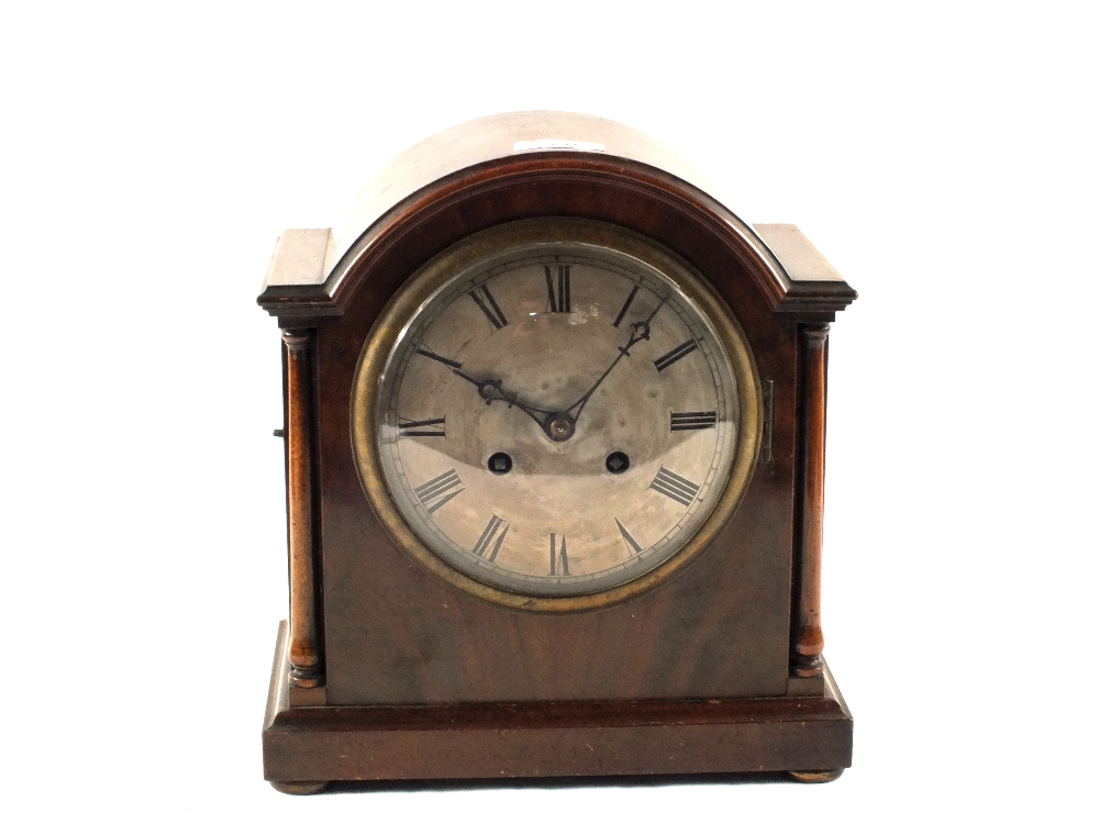 A Mahogany striking mantel clock