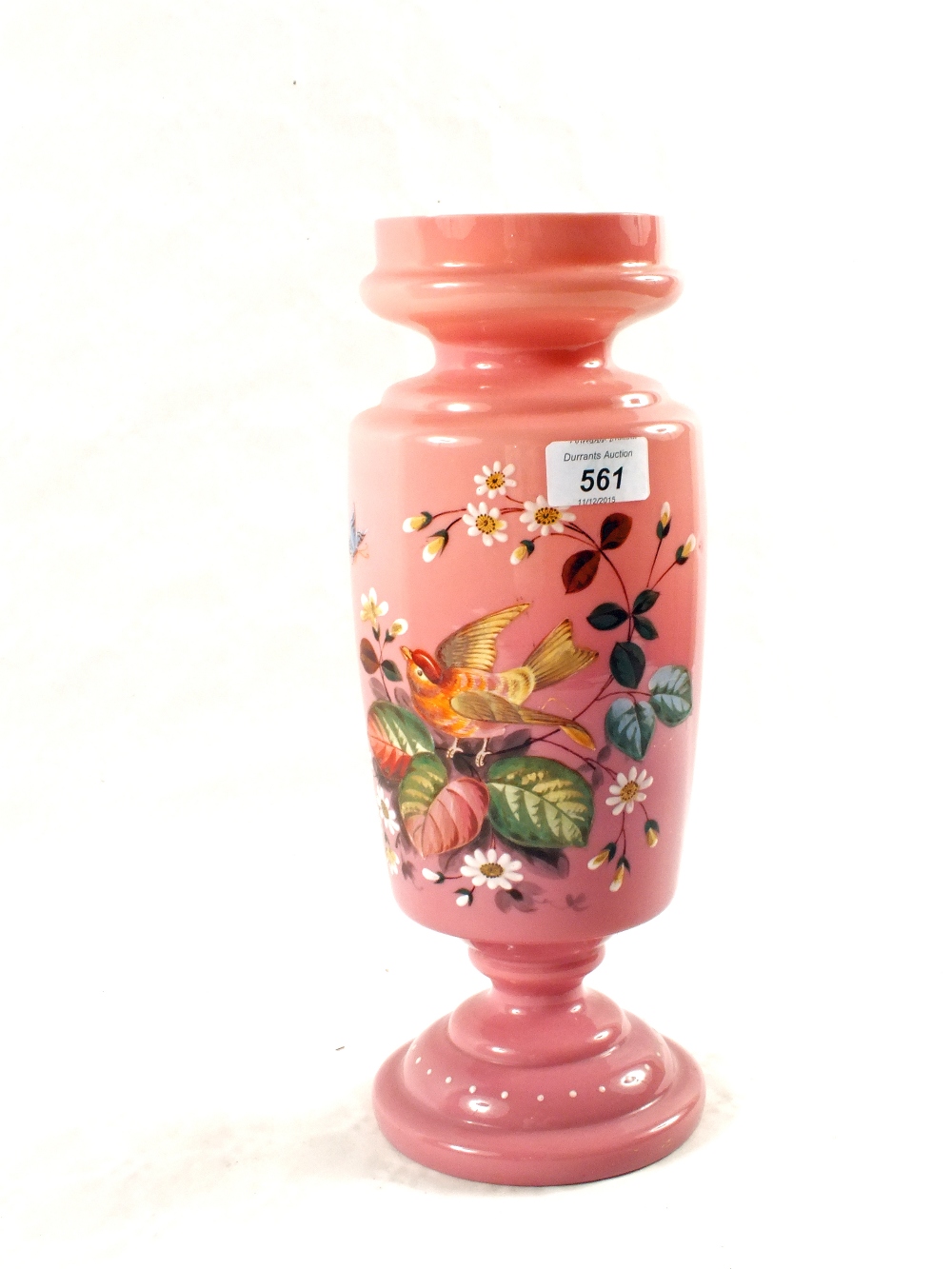 A Victorian pink opal glass vase with bird and floral decoration