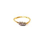 An 18ct Gold three stone Diamond ring,