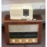 A cream Bakelite mains radio and a Bush wooden cased radio