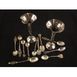 A pair of Silver spill vases plus Silver and Silver plated souvenir spoons