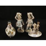 Four 19th Century continental porcelain figural ornaments