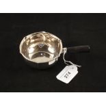 A white metal small pan,