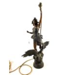 A French spelter table lamp of a lady with torch on eagle