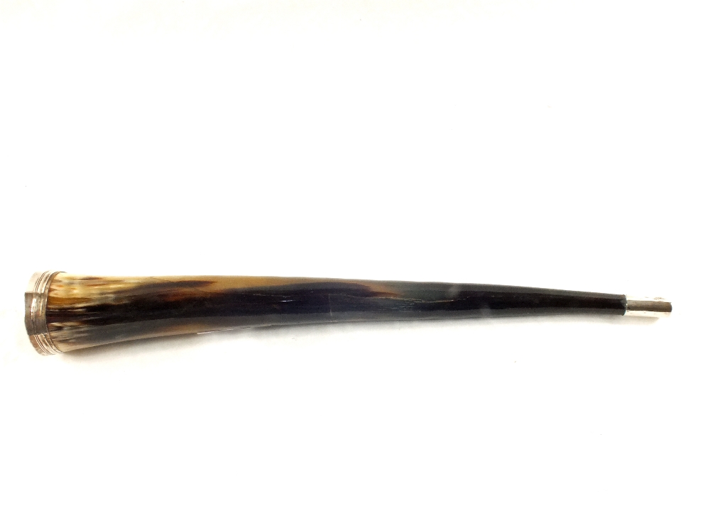 A hunting horn with horn trumpet and Silver metal mounts,