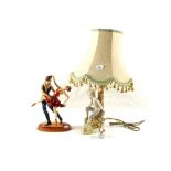 A Spanish porcelain figural table lamp and flamenco group