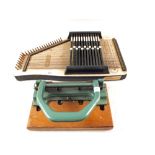 A Hopf Autoharp and a heavy duty hole punch