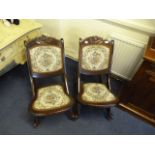 Pair of Mahogany Upholstered Rocking Chairs