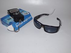*Portable Luggage Scale & Pair of Sun Dog Condem Polaroid Sunglasses