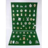 Collection of 55 Assorted Military Cap Badges