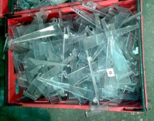 Box containing large quantity of Polycarbonate 200mm slatwall shelf brackets
