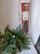 Artificial Christmas Tree and an Illuminating Christmas Hanging Basket