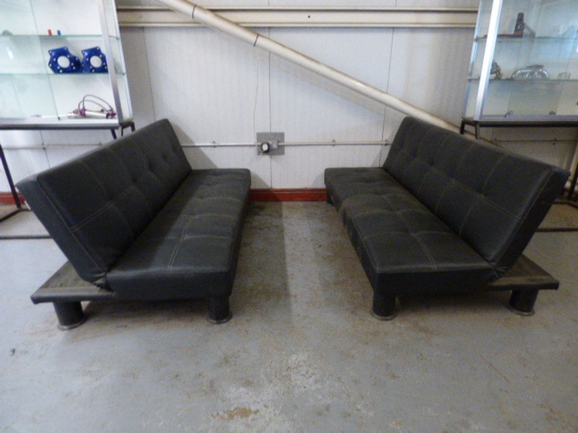 *Pair of Black Faux Leather Reception Couches