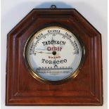 A Taddy & Co Orbit tobacco advertising wall barometer, of shaped moulded form, centred by a circular