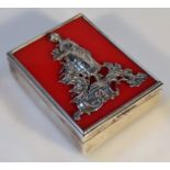 An Edwardian silver card case, by Carrington & Co, of rectangular form, the lid raised with the