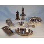 Various silver plate, comprising a six sectional toast rack, a dish of floral circular form, 22.