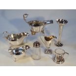 Various silver plate, comprising a cream jug of helmet shape form, with a 'C' scroll handle on
