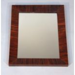 A rosewood framed hanging mirror, of rectangular form with plain glass, principally 19thC, 50cm