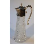 An Edwardian silver plate and cut glass claret jug, with flame knop, flying 'S' scroll handle and