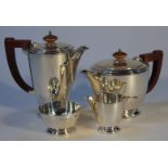 A George V bachelor's tea service, by Adie Brothers Ltd, comprising coffee pot, 16cm high, teapot,