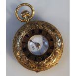 A half hunter pocket watch, the engine turned case set with scrolls and flowers, with stencilled
